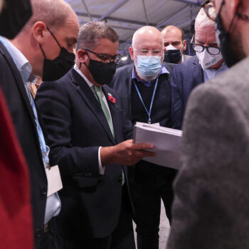 UK COP26 President Alok Sharma takes amended text to Frans Timmermans. Image via Flickr: UK government (Tim Hammond / No 10 Downing Street)