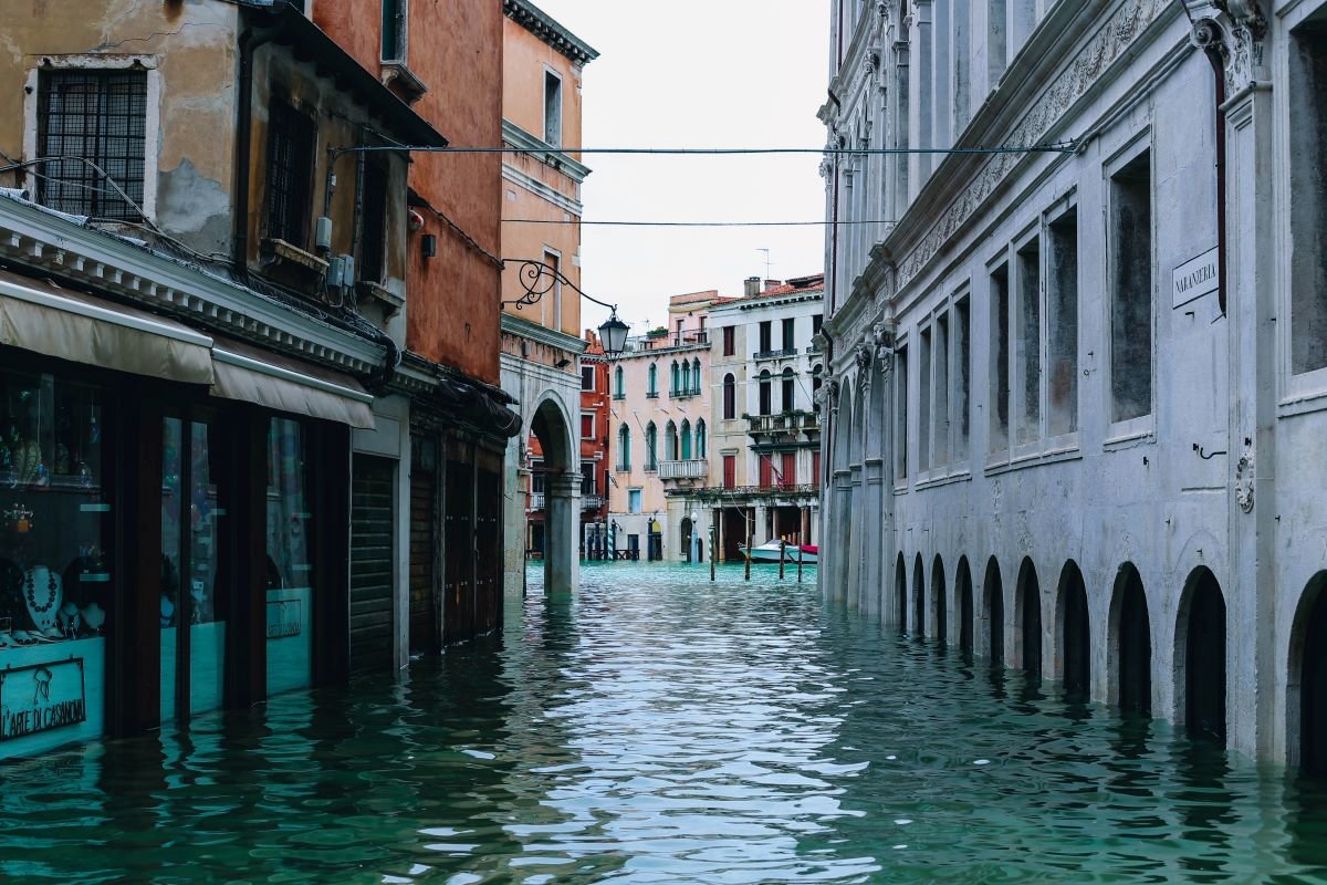 A canal in Venice, Italy. Photo by Nastya Dulhiier on Unsplash.