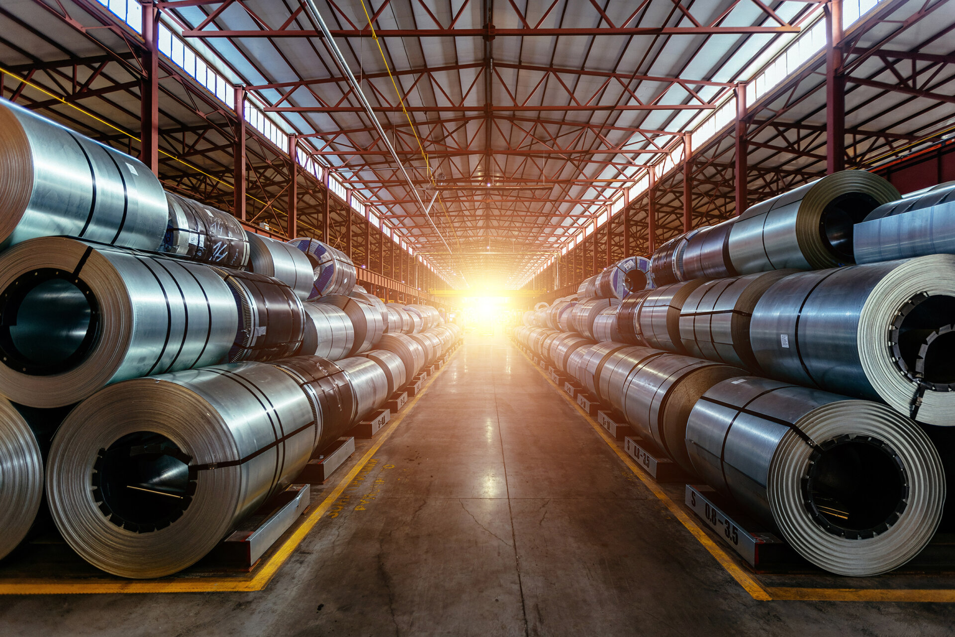 Rolls of galvanized steel sheet inside the factory or warehouse