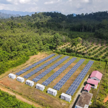 Installation of solar panels in the middle of agricultural and forest areas in the rural area of Merabu, Berau Regency, East Kalimantan, Indonesia. Solar panel technology is utilized for remote areas