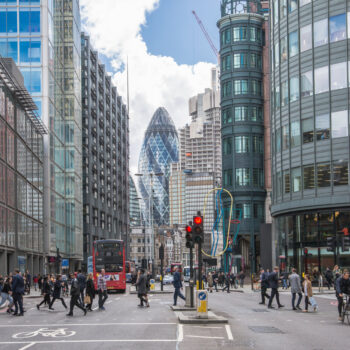 London, UK.  City of London busy street with view  with lots of