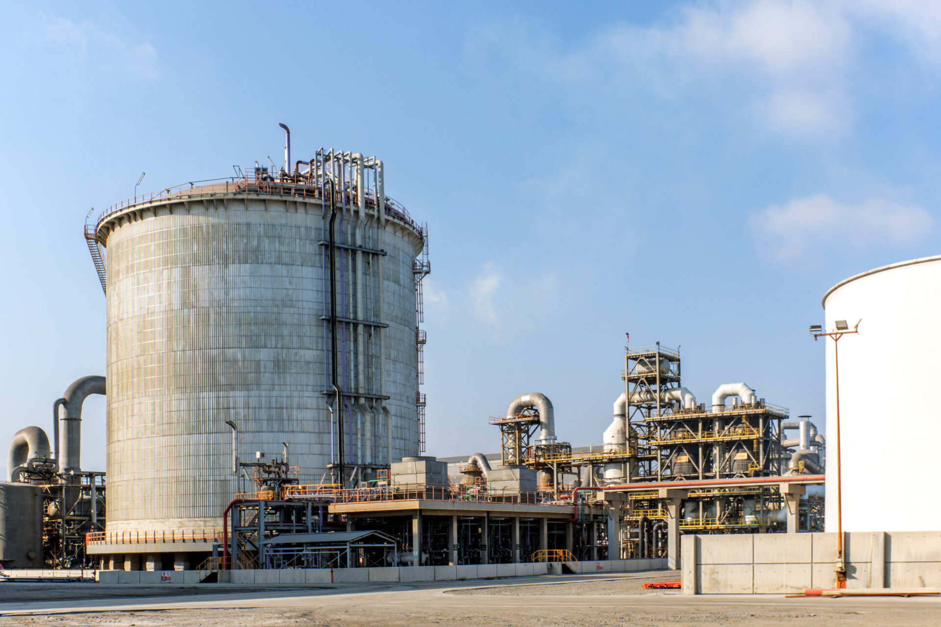 View of the double walled, vertical, cylindrical ammonia storage