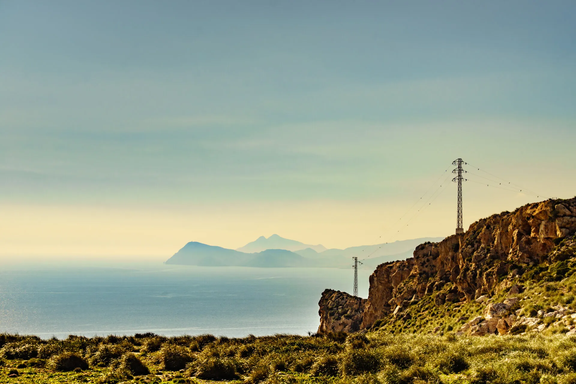 High voltage towers on spanish coast