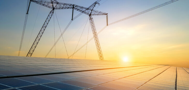 High voltage pylons with electric power lines transfering electr