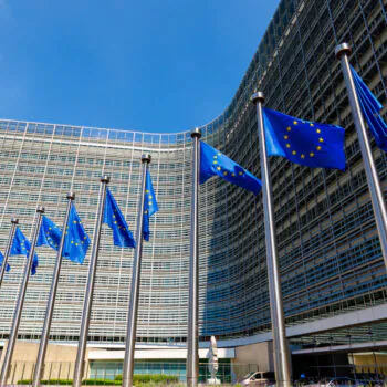 European Union flags in front of the European Commission building in Brussels, Belgium