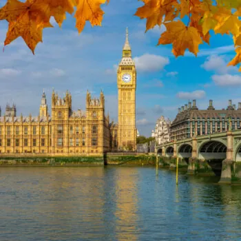 Big Ben with Houses of Parliament and Westminster bridge in autumn, London, UK