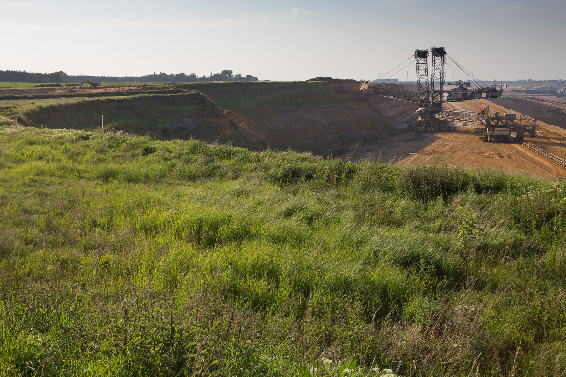 bucket-wheel excavator in open-cast coal mining in germany