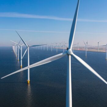 Aerial view of wind turbines in the North Sea. Crowding in private finance is key to the UK's transition and economic future.
