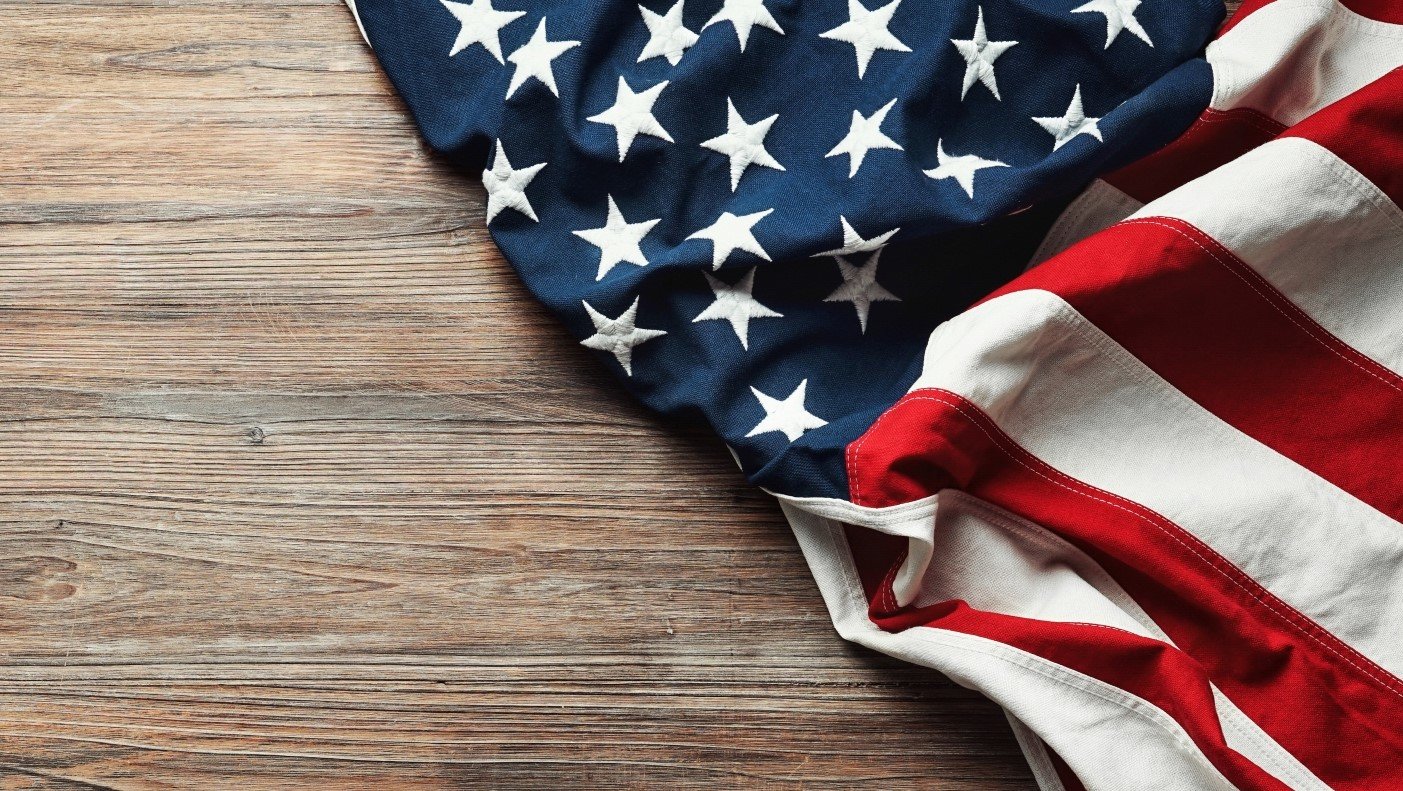 American flag on wooden table