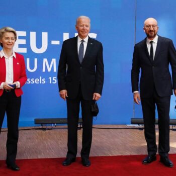 President of the European Commission, Ursula Von Der Leyen, US President, Joe Biden, and President of the European Council, Charles Michel, with an EU-US Summit 2021 banner behind and a flag of the USA.