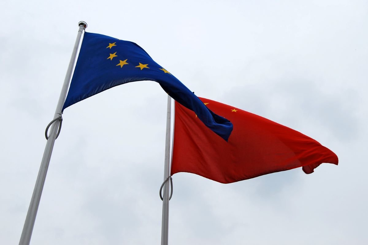 EU and China flags. Photo by Mark Knoke on Flickr.