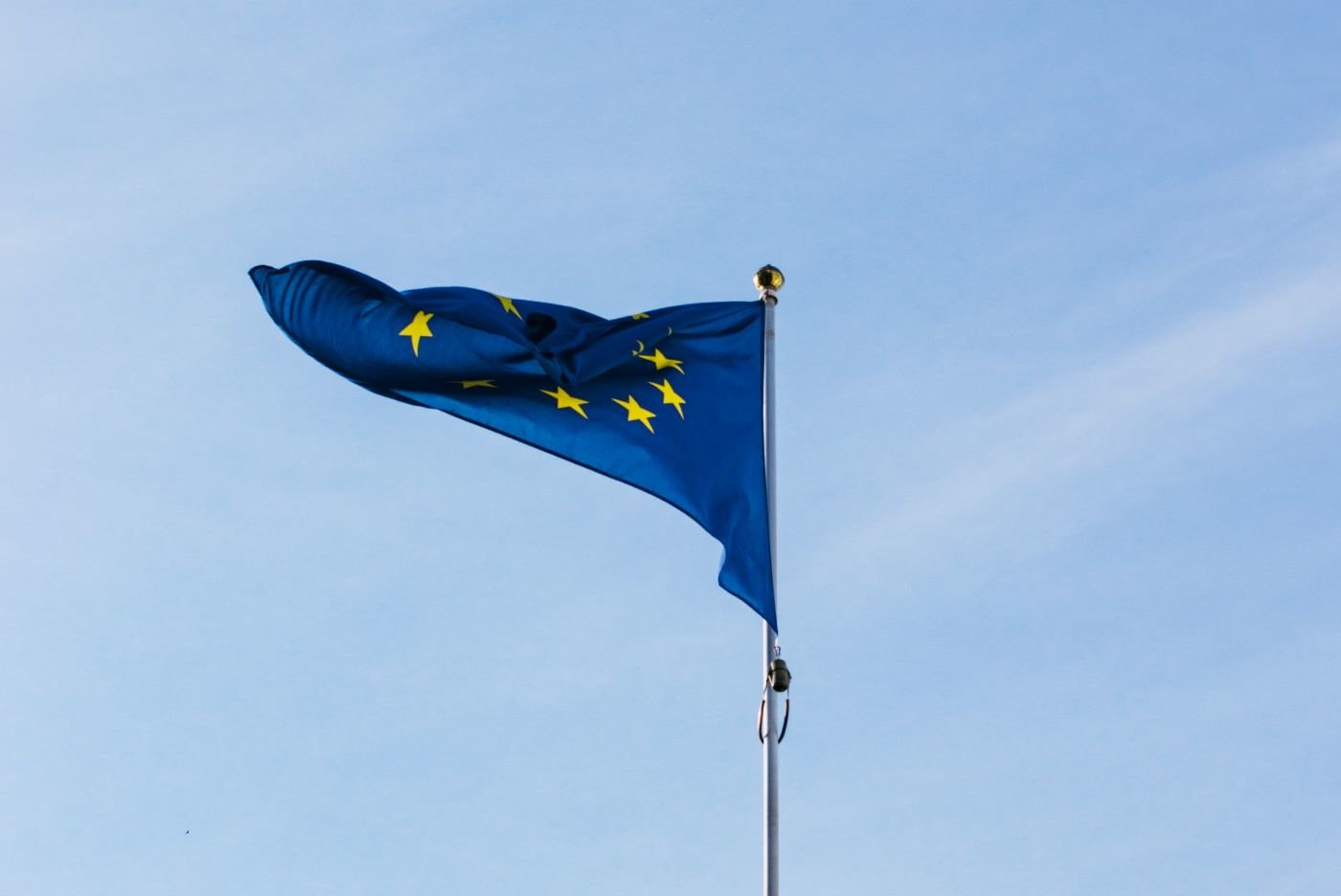 EU flag against blue sky