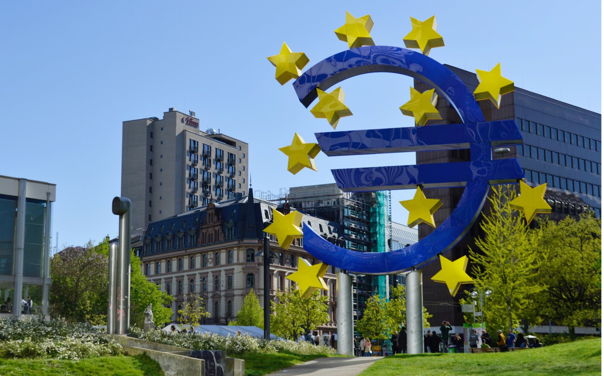 The photo shows the sculpture of an euro symbol from behind, so the symbol appears reverted. The sculpture is placed at the headquarters of the European Central Bank in Frankfurt, Germany.