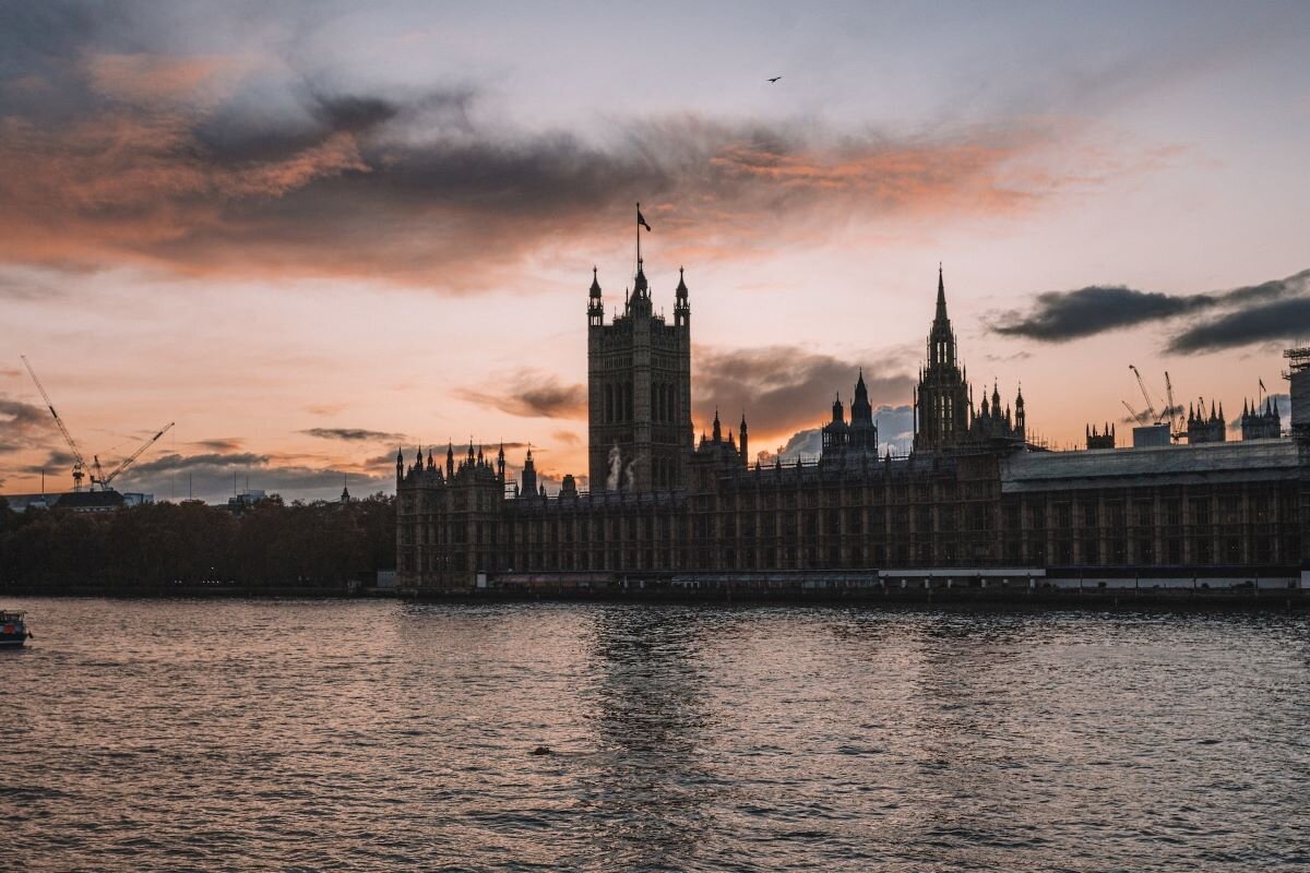 Evening light on UK Houses of Parliament, London. Photo by Federico Di Dio on Unsplash.