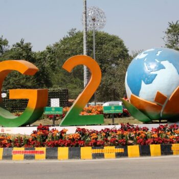 A G20 India's presidency logo on a roundabout.