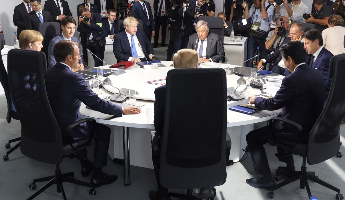 G7 leaders sit at a roundtable at the summit in 2019