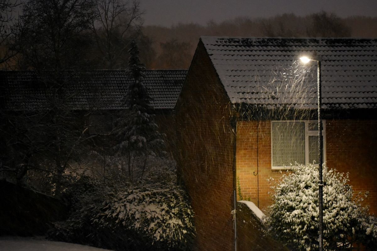 Landscape with an old house in the night in winter, Coventry, England, UK