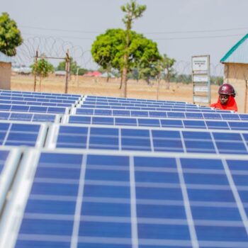 Off-grid, renewable energy technologies, like solar panels, are unlocking access to clean and sustainable energy across communities in Nigeria. Photo via Power Africa on flickr.