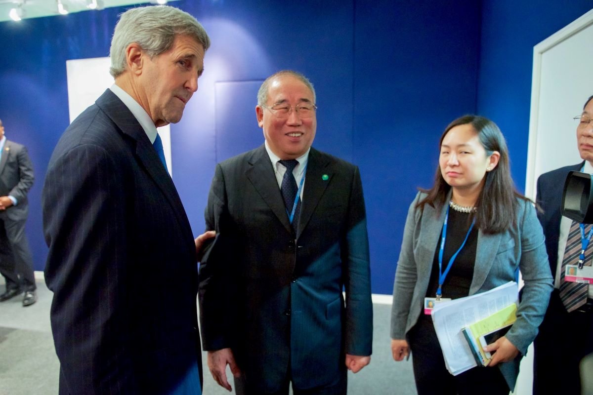 Secretary Kerry Chats With Chinese Special Envoy for Climate Change Xie Before Their Meeting at COP21 in Paris Image via Flickr statephotos