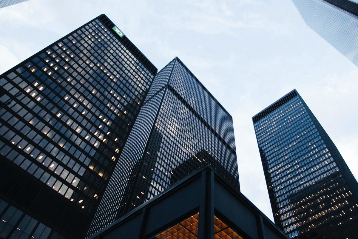 Three tall financial buildings from below