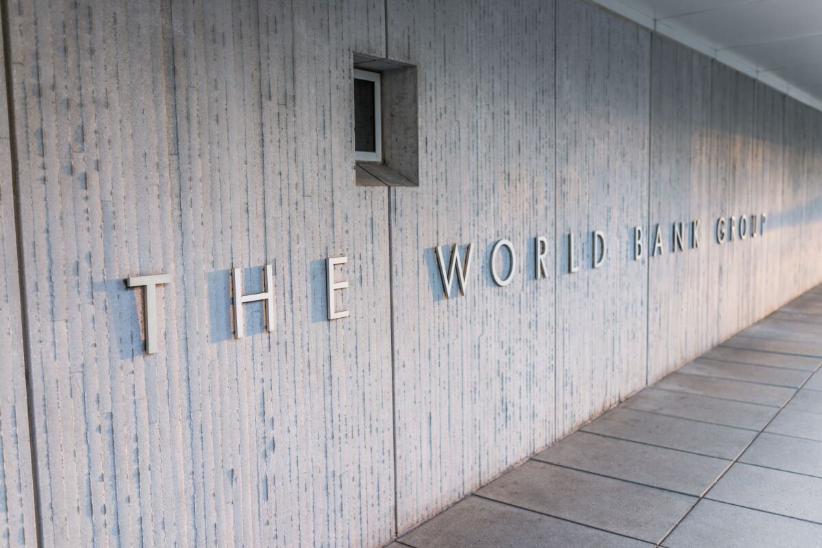 The World Bank Group sign outside building in Washington DC. Photo via Adobe.