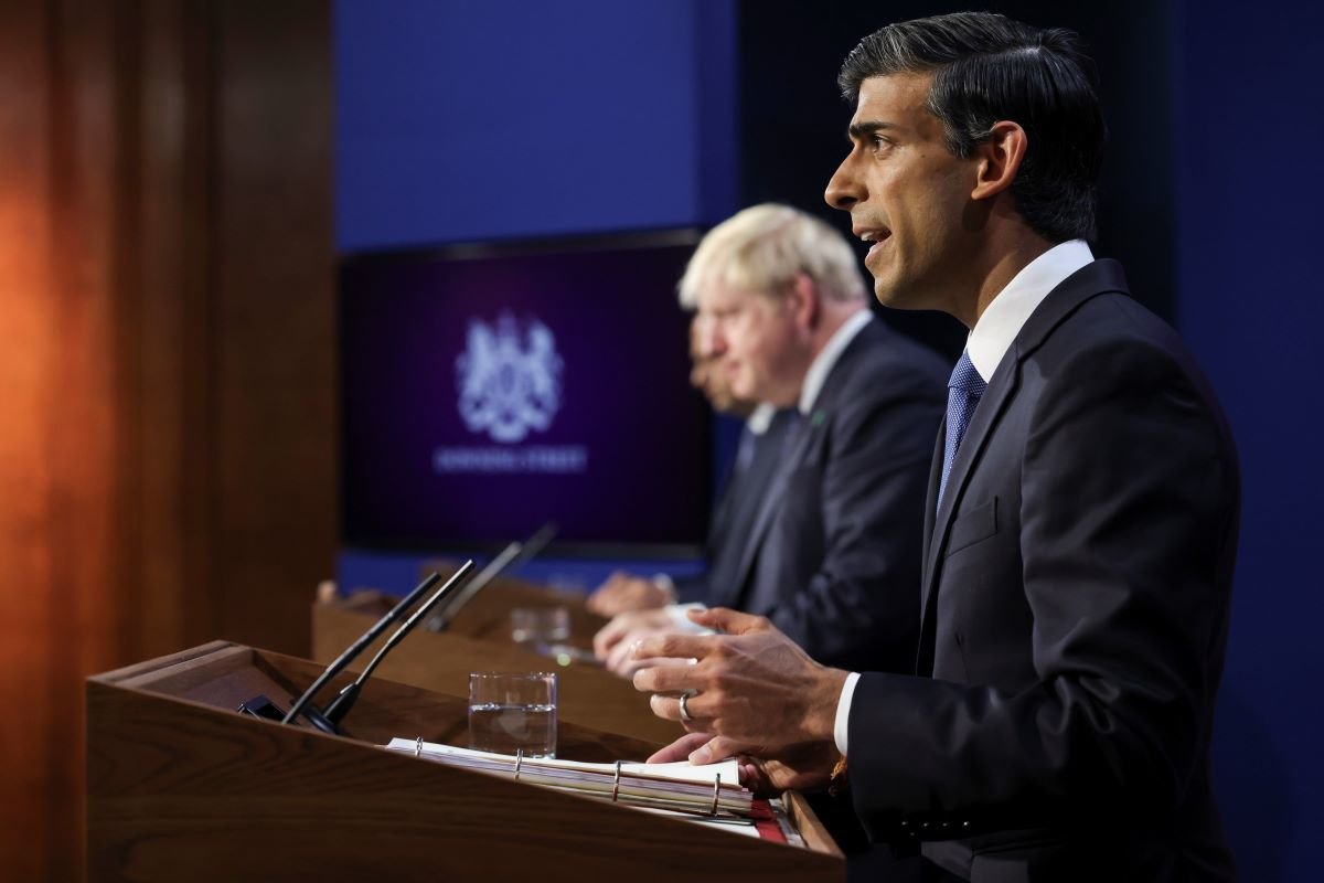 UK Chancellor Rishi Sunak speaks at a press conference in September with UK PM Boris Johnson in the background. Photo via Number 10 on Flickr