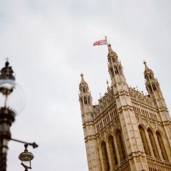 UK flag flying in Westminster, London.