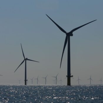 View of windmills of Rampion windfarm off the coast of Brighton, Sussex, UK.