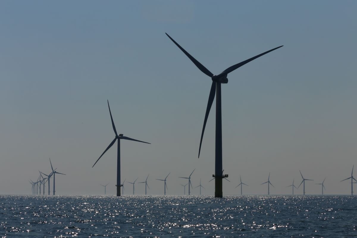 View of windmills of Rampion windfarm off the coast of Brighton, Sussex, UK.
