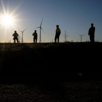Workers monitor wind turbines in Chile. Governments must rapidly introduce policies and measures to spur the clean energy transformation and reduce emissions by at least 45% by 2030. Photo by Tamara Merino for IMF on flickr.