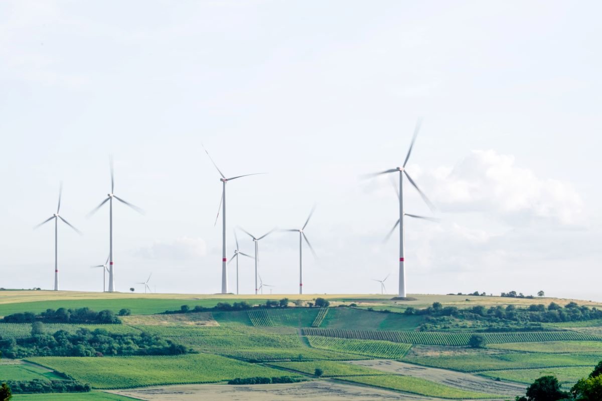 Wind turbines in a green field, Mölsheim, Germany.