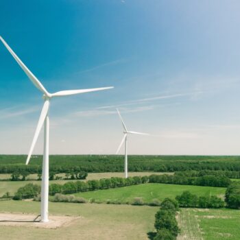 Windmills in France. Following 7 European countries withdrawing from the Energy Charter Treaty, the international investment regime needs an overhaul. Photo by Tomas Reaubourg on Unsplash.