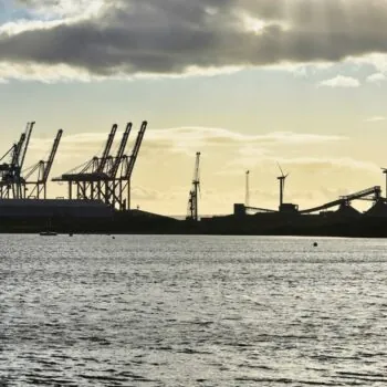 Industry and construction cranes at a port in Liverpool.