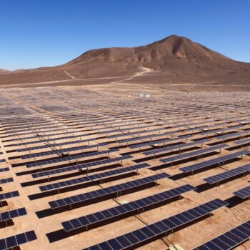 Solar panels in a desert landscape in Chile