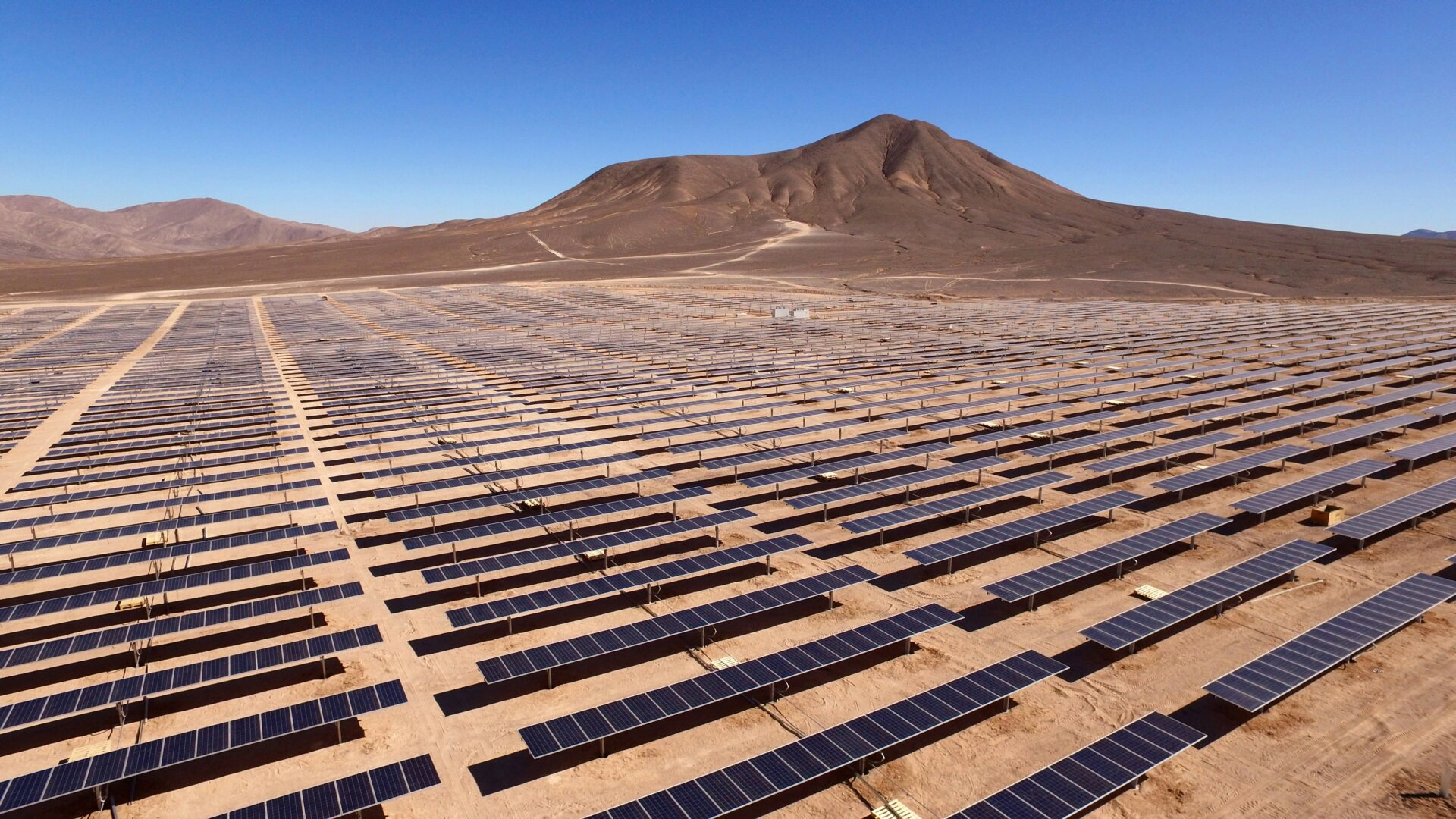 Solar panels in a desert landscape in Chile