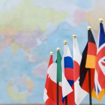 flags of G7 countries and global map