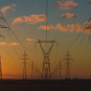 Power pylons at sunset